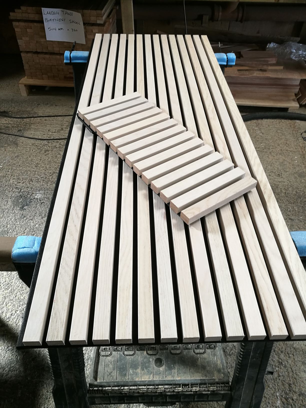 Timber slat panel on workbench at BCL factory