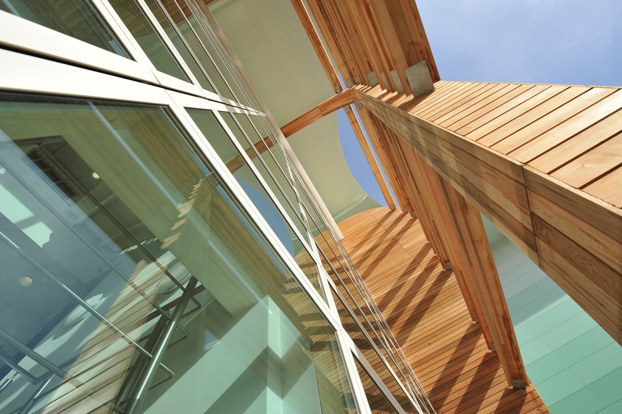Ground level photo of BCL timber cladding wooden slat panel systems used at Blue Plant G Park in Stoke