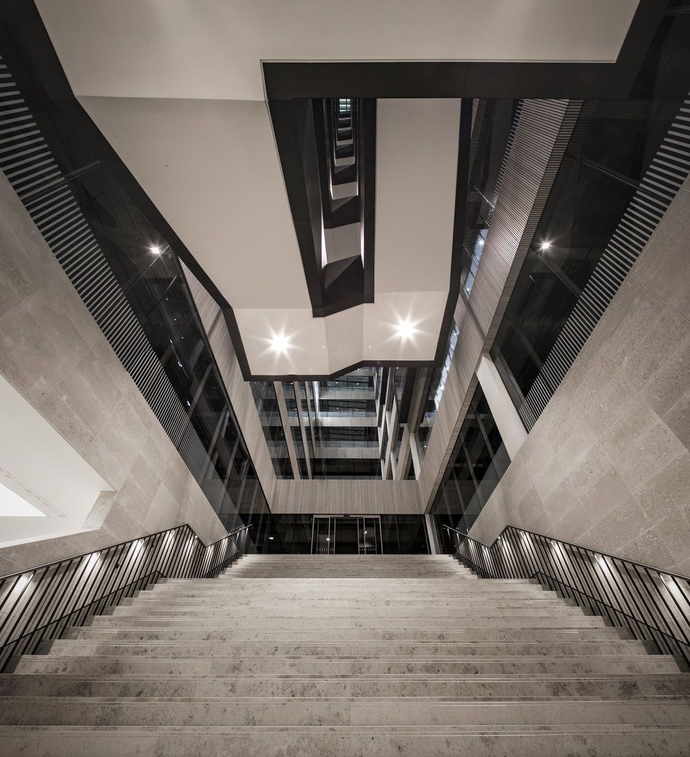 Acoustic timber walls over stairway at 160 Aldersgate