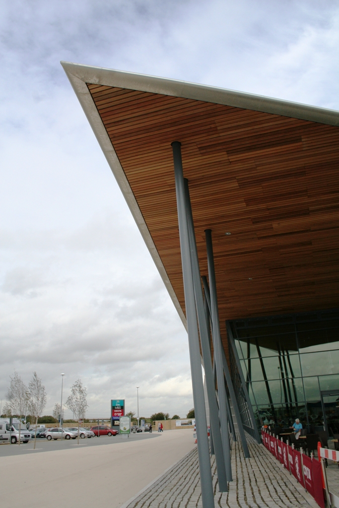 Timber slat panels by BCL on external wood ceiling at Moto Services, Wetherby